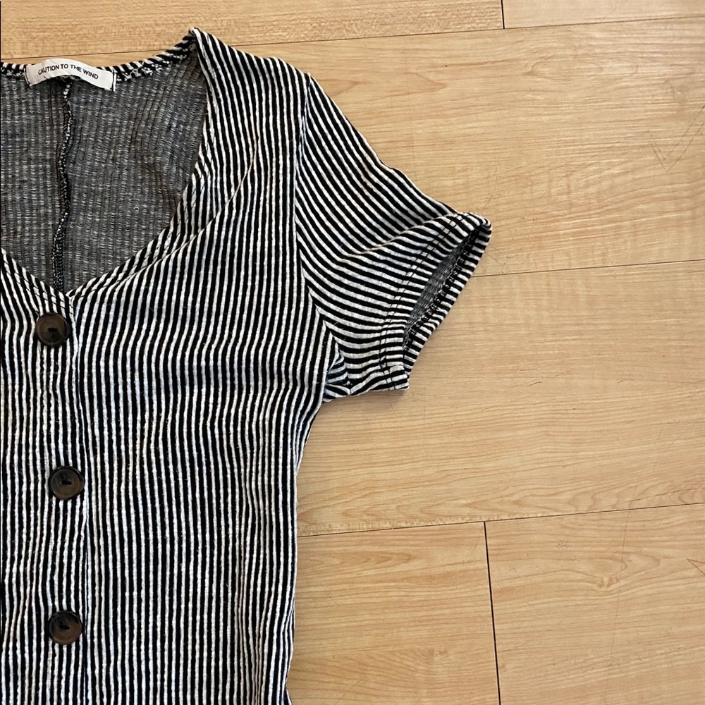 Black and white button front fit and flare dress